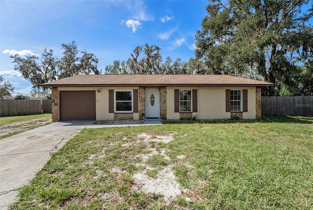 ranch-style house with a garage and a front yard