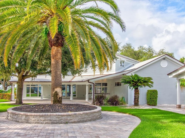 exterior space with a lawn