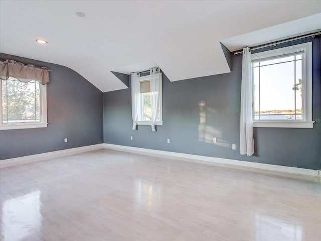 bonus room featuring lofted ceiling