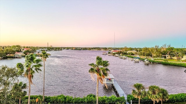 property view of water featuring a boat dock