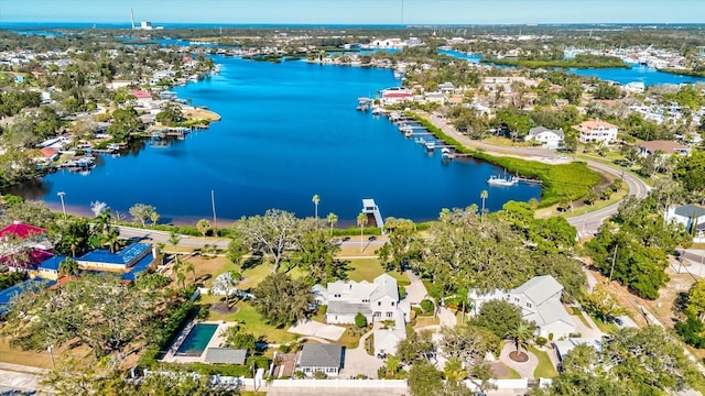 bird's eye view with a water view