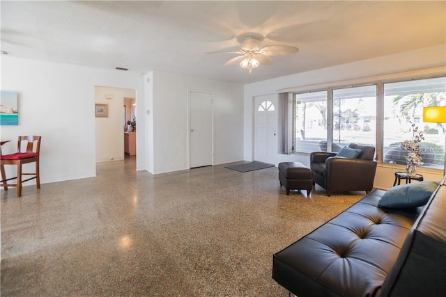 living room with ceiling fan