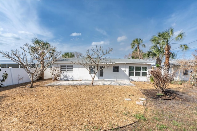 rear view of property with a patio