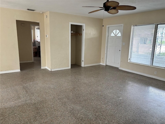 foyer featuring ceiling fan