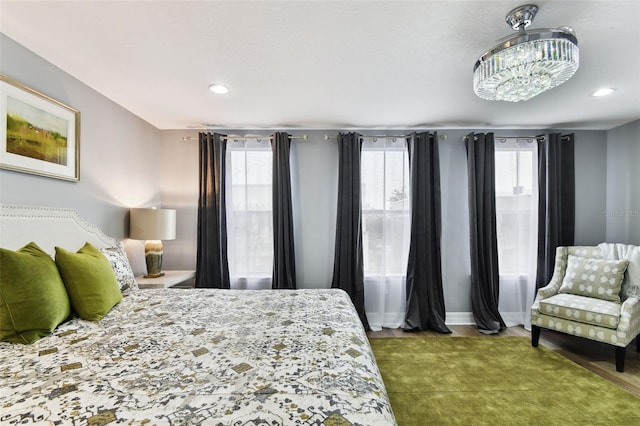 bedroom featuring a chandelier