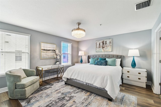 bedroom featuring hardwood / wood-style flooring