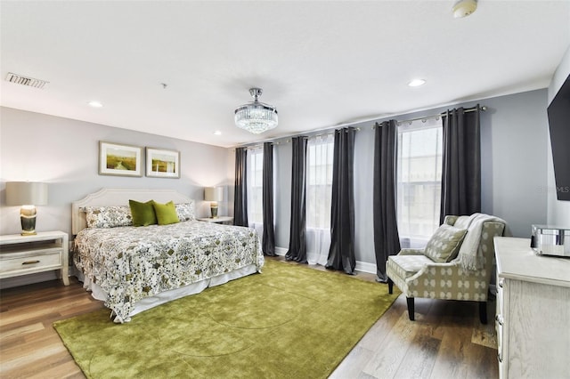 bedroom featuring hardwood / wood-style flooring