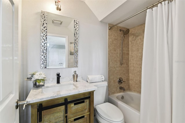 full bathroom with vanity, shower / bath combination with curtain, lofted ceiling, and toilet