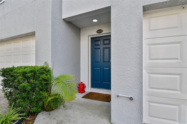 entrance to property with a garage