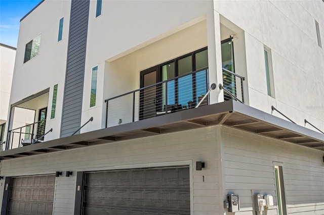 view of property exterior featuring a garage