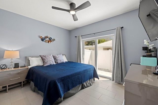 tiled bedroom featuring ceiling fan and access to outside