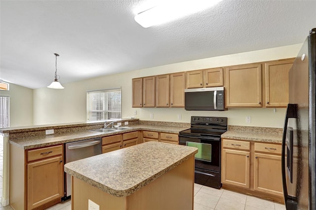 kitchen with a kitchen island, appliances with stainless steel finishes, hanging light fixtures, light countertops, and a sink