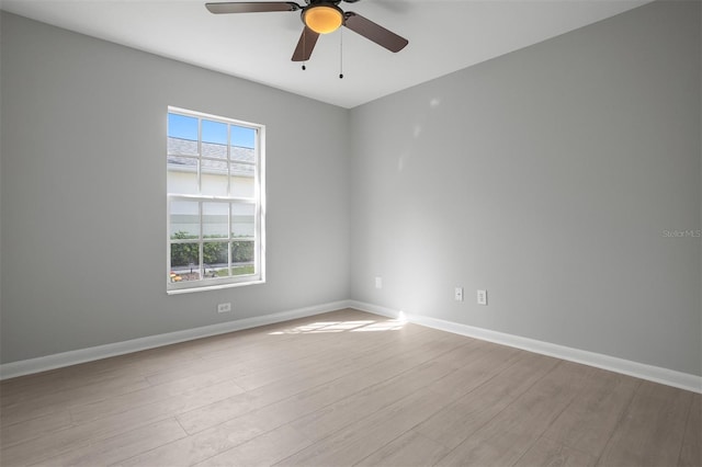 unfurnished room with ceiling fan and light hardwood / wood-style flooring