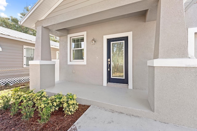 property entrance with a porch