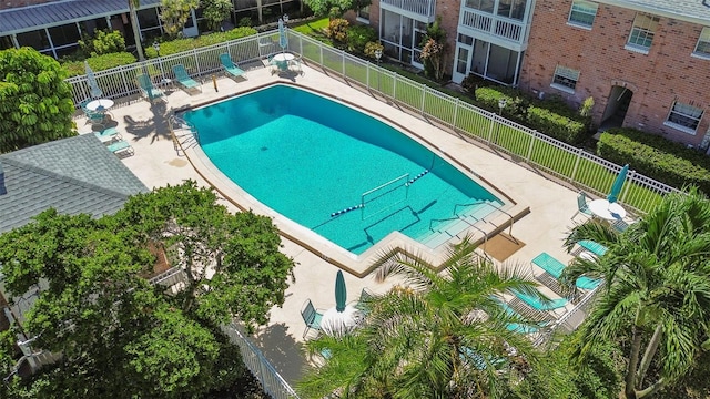 view of swimming pool with a patio