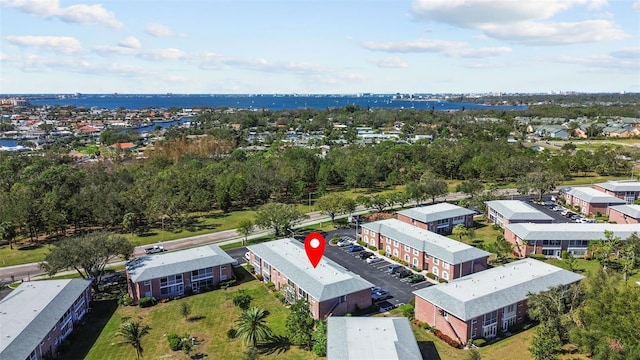 drone / aerial view featuring a water view