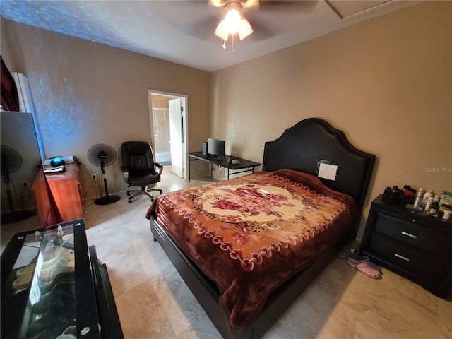 bedroom with ceiling fan and ensuite bathroom