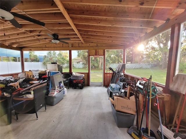 sunroom featuring ceiling fan and lofted ceiling