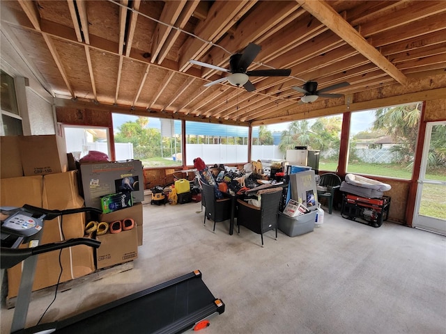 sunroom / solarium with ceiling fan and a healthy amount of sunlight