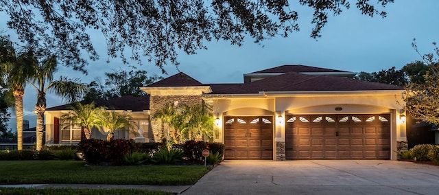 view of front of property featuring a garage