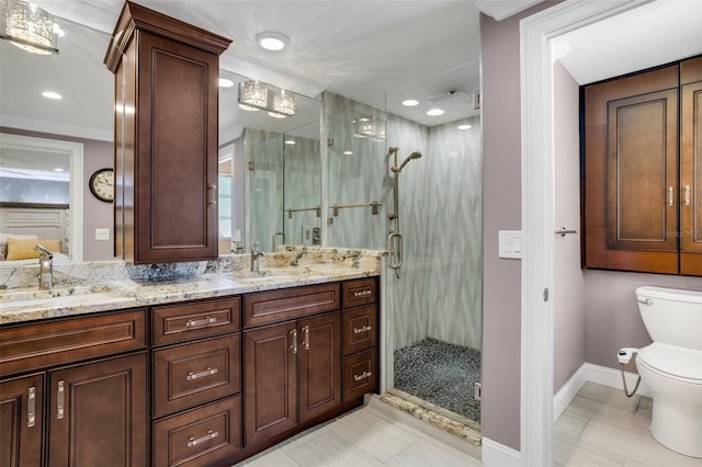 bathroom featuring walk in shower, tile patterned flooring, vanity, and toilet