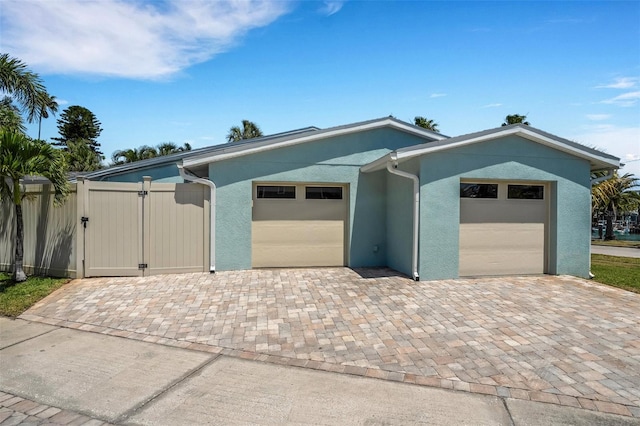 view of front of property featuring a garage