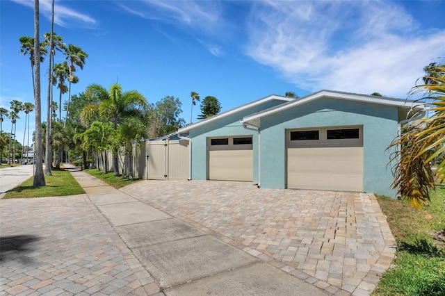 view of front of property with a garage