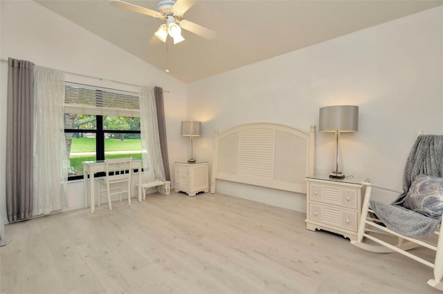 bedroom with light hardwood / wood-style flooring, lofted ceiling, and ceiling fan