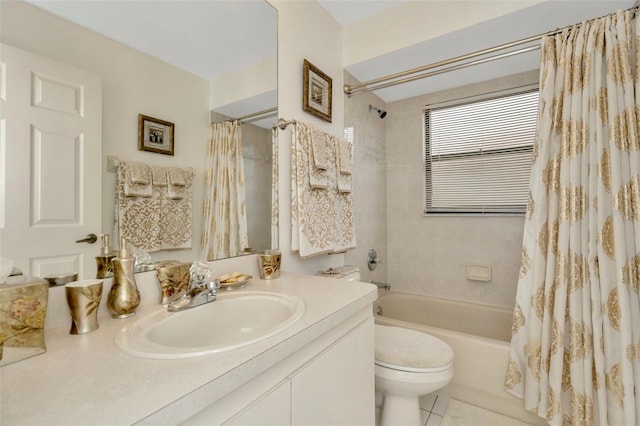 full bathroom with toilet, vanity, shower / bath combo with shower curtain, and tile patterned floors