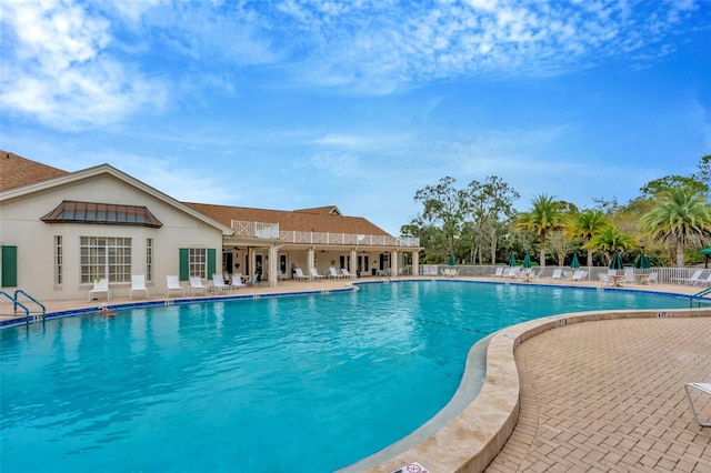 view of swimming pool featuring a patio