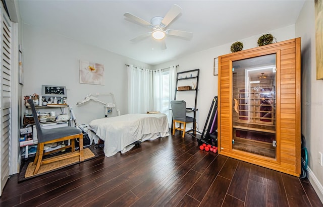 bedroom featuring hardwood / wood-style floors and ceiling fan