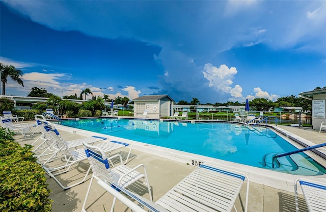 view of pool with a patio