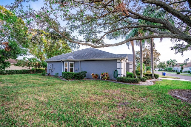 view of property exterior featuring a yard