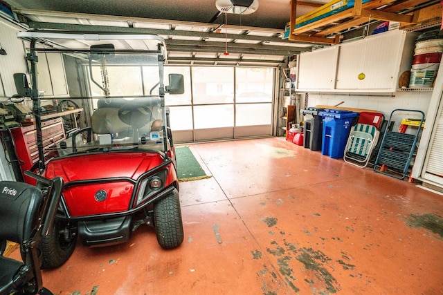 garage featuring a garage door opener