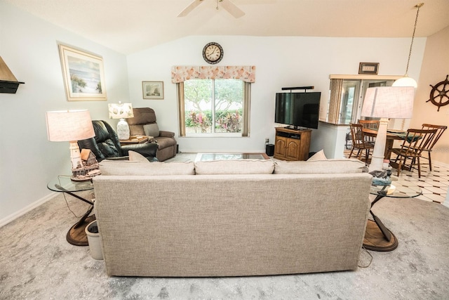 living room featuring lofted ceiling and ceiling fan