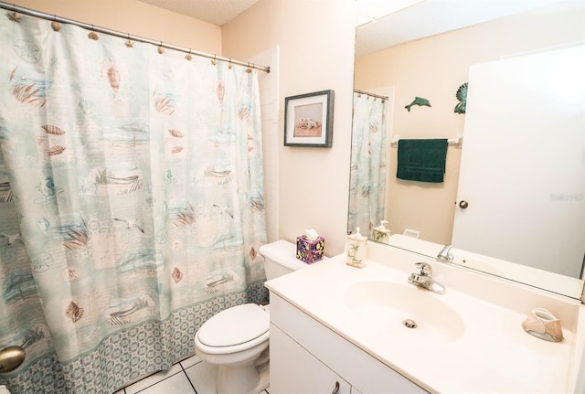 bathroom featuring vanity, tile patterned floors, a textured ceiling, and toilet