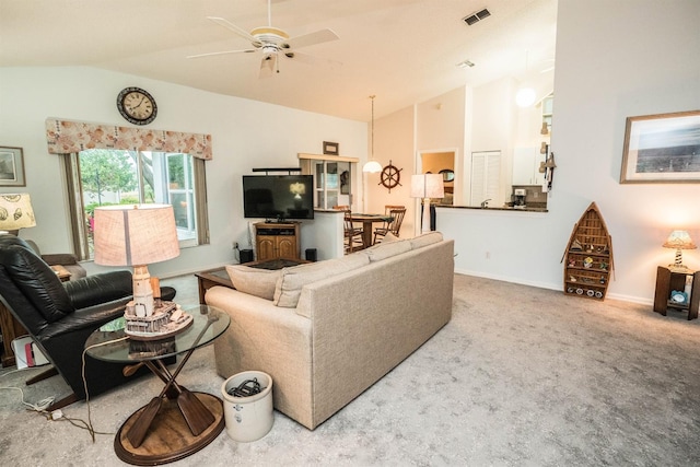 carpeted living room with lofted ceiling and ceiling fan