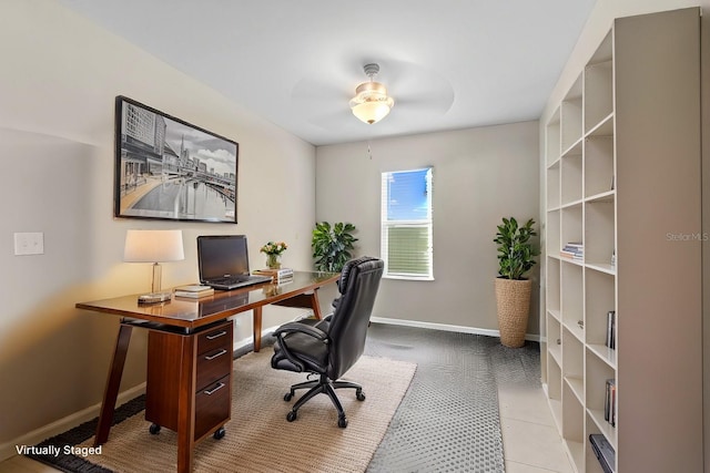 office area featuring ceiling fan and light tile patterned floors