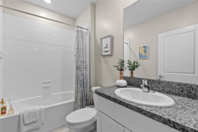 full bathroom featuring vanity, toilet, and shower / tub combo