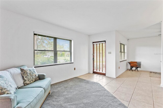 living room with light tile patterned floors