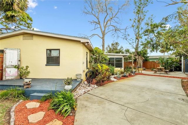 view of home's exterior with a patio area