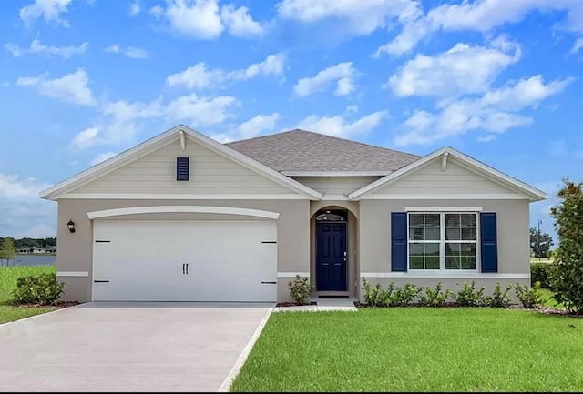 ranch-style home with a garage and a front lawn