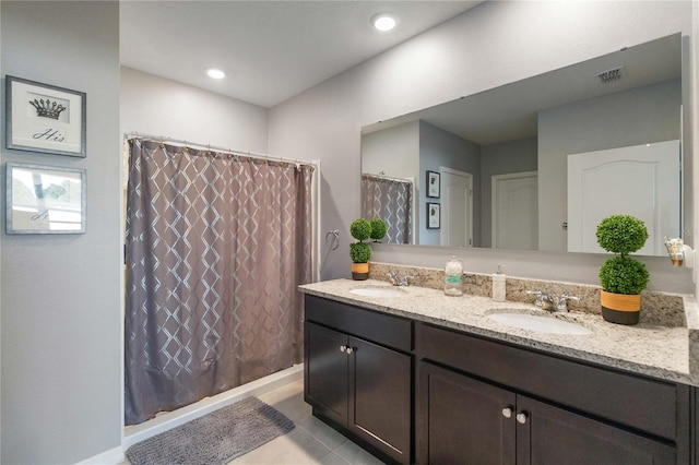 bathroom featuring vanity and tile patterned floors