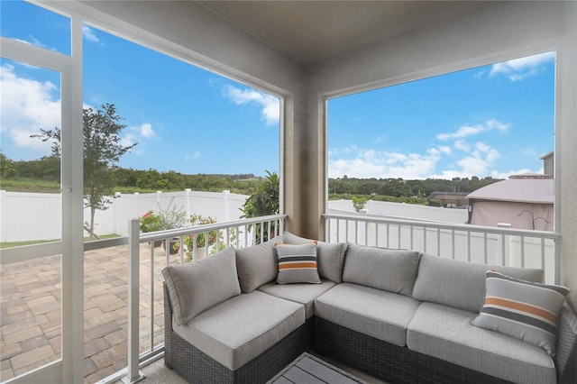 sunroom / solarium with plenty of natural light