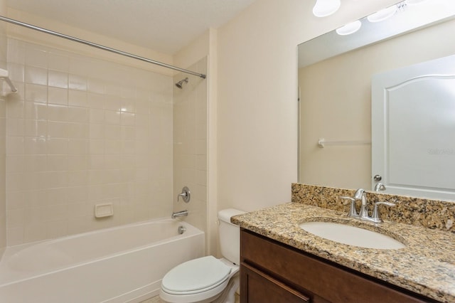 full bathroom with shower / bathing tub combination, vanity, and toilet