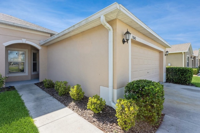 view of property exterior featuring a garage