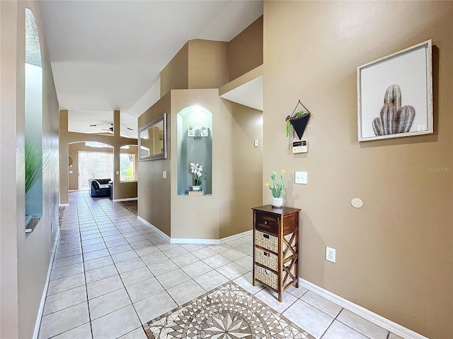 hallway featuring light tile patterned floors