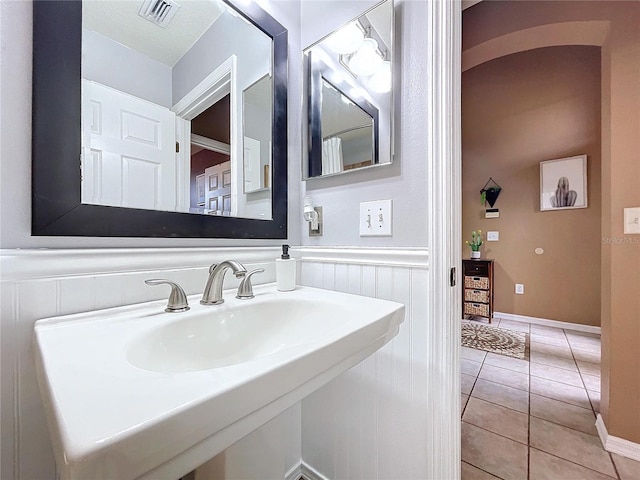 bathroom featuring tile patterned flooring