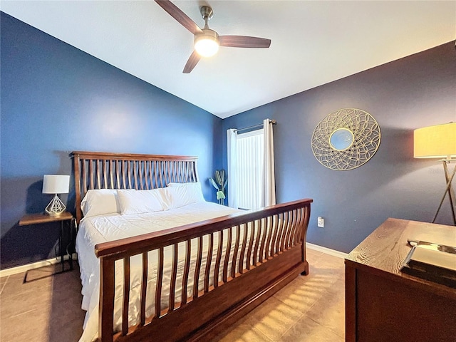 bedroom with ceiling fan and lofted ceiling