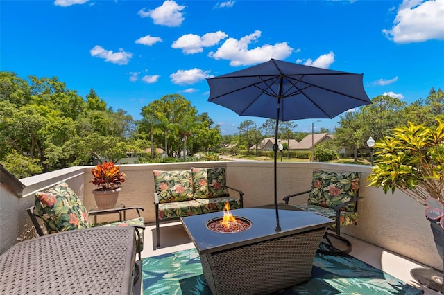 balcony featuring a fire pit